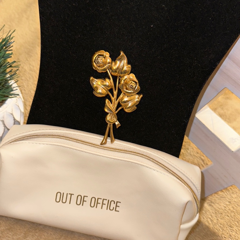 Gold floral brooch
